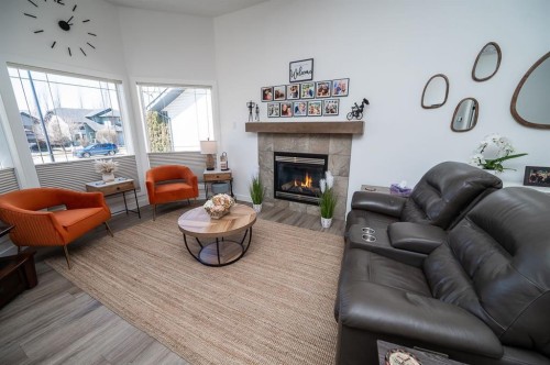 355 Duston Street, Red Deer, AB - Indoor Photo Showing Living Room With Fireplace