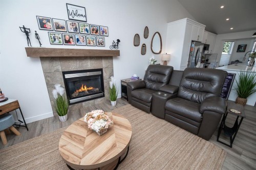 355 Duston Street, Red Deer, AB - Indoor Photo Showing Living Room With Fireplace