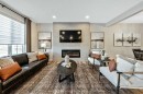 146 Osprey Hill Way Sw, Calgary, AB  - Indoor Photo Showing Living Room With Fireplace 