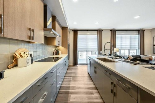 146 Osprey Hill Way Sw, Calgary, AB - Indoor Photo Showing Kitchen With Double Sink With Upgraded Kitchen