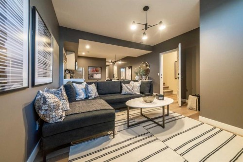 152 Snowberry Common Se, Calgary, AB - Indoor Photo Showing Living Room