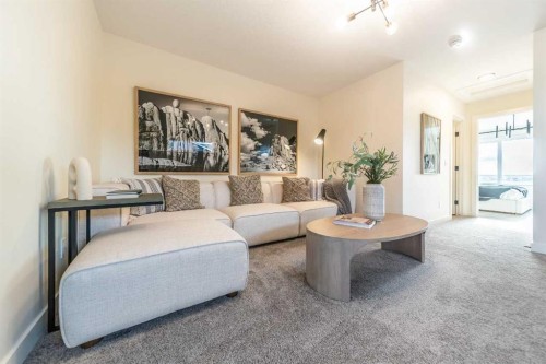 152 Snowberry Common Se, Calgary, AB - Indoor Photo Showing Living Room
