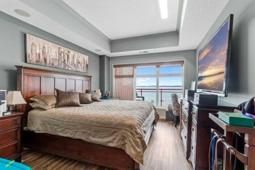 401-5100 Lakeshore Drive, Sylvan Lake, AB - Indoor Photo Showing Bedroom