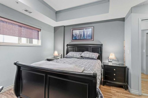 401-5100 Lakeshore Drive, Sylvan Lake, AB - Indoor Photo Showing Bedroom
