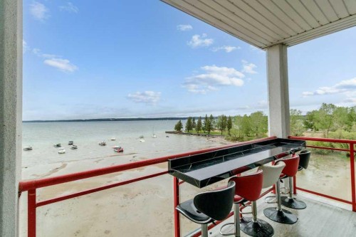 401-5100 Lakeshore Drive, Sylvan Lake, AB - Outdoor With Body Of Water With Balcony With View With Exterior