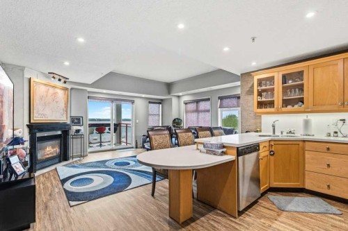 401-5100 Lakeshore Drive, Sylvan Lake, AB - Indoor With Fireplace