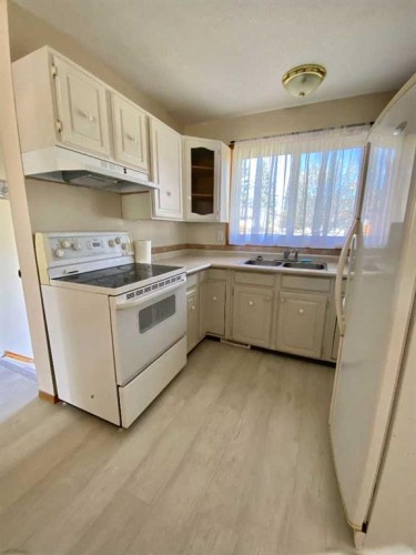 6302 Marler Drive, Camrose, AB - Indoor Photo Showing Kitchen With Double Sink