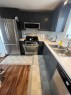 16 Main Street, Edberg, AB  - Indoor Photo Showing Kitchen With Double Sink 