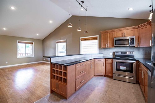 4024-25054 South Pine Lake Road, Rural Red Deer County, AB - Indoor Photo Showing Kitchen With Stainless Steel Kitchen