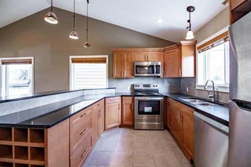 4024-25054 South Pine Lake Road, Rural Red Deer County, AB - Indoor Photo Showing Kitchen With Stainless Steel Kitchen With Double Sink