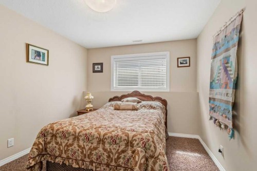 38 Lucky Place, Sylvan Lake, AB - Indoor Photo Showing Bedroom
