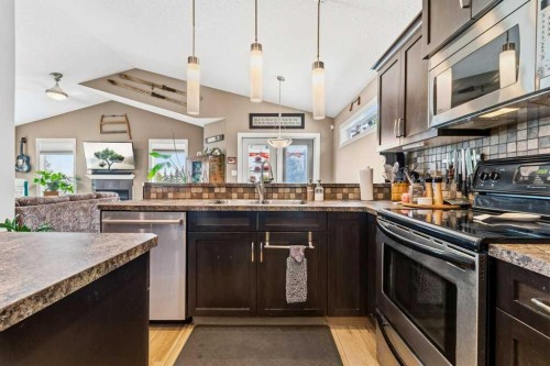 38 Lucky Place, Sylvan Lake, AB - Indoor Photo Showing Kitchen With Double Sink