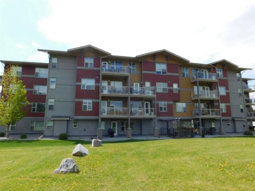 203-5901 71 Avenue, Rocky Mountain House, AB - Outdoor With Balcony With Facade