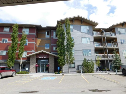 203-5901 71 Avenue, Rocky Mountain House, AB - Outdoor With Balcony With Facade