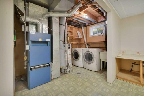 22 Blackstone Avenue, Lacombe, AB - Indoor Photo Showing Laundry Room