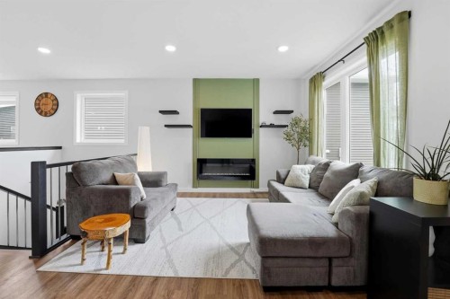 77 Murphy Close, Blackfalds, AB - Indoor Photo Showing Living Room With Fireplace