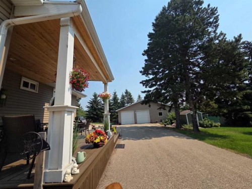 3, 26575 Hwy 11, Rural Red Deer County, AB - Indoor With Fireplace