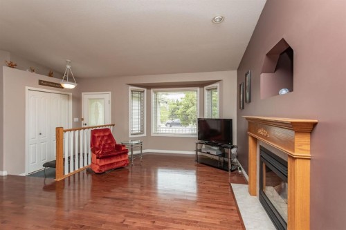 189 Lampard Crescent, Red Deer, AB - Indoor Photo Showing Living Room With Fireplace