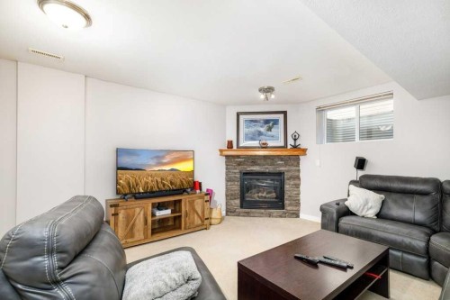 46 James Street, Red Deer, AB - Indoor Photo Showing Living Room With Fireplace