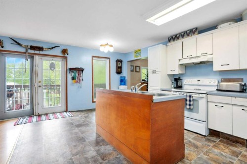 35005 Range Road 15, Rural Red Deer County, AB - Indoor Photo Showing Kitchen With Double Sink