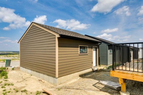 57 Bluerock Hill Sw, Calgary, AB - Outdoor With Exterior