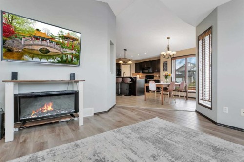 50 Wilkinson Circle, Sylvan Lake, AB - Indoor Photo Showing Living Room With Fireplace