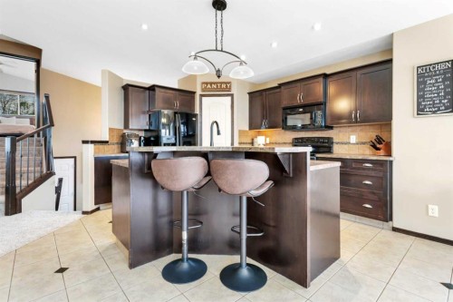 50 Wilkinson Circle, Sylvan Lake, AB - Indoor Photo Showing Kitchen With Upgraded Kitchen