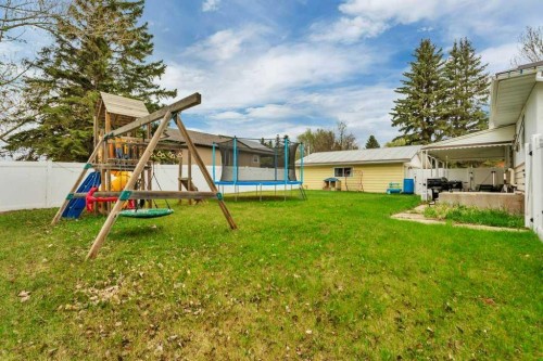 5606 58 Street, Lacombe, AB - Outdoor With Backyard