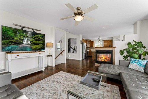 199 Adams Close, Red Deer, AB - Indoor Photo Showing Living Room With Fireplace