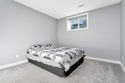 5012 62 Avenue, Ponoka, AB - Indoor Photo Showing Bedroom