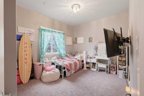 1 Rosewood Rise, Sylvan Lake, AB - Indoor Photo Showing Bedroom