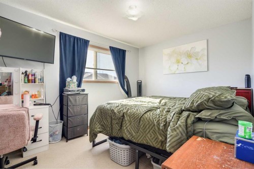 536-100 Jordan Parkway, Red Deer, AB - Indoor Photo Showing Bedroom