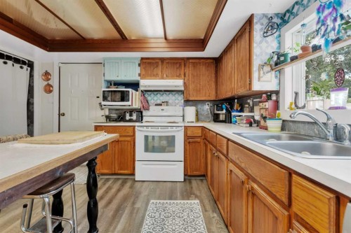 4520 36 Avenue, Ponoka, AB - Indoor Photo Showing Kitchen With Double Sink