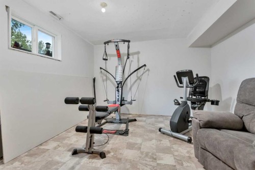 4520 36 Avenue, Ponoka, AB - Indoor Photo Showing Gym Room