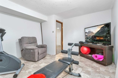 4520 36 Avenue, Ponoka, AB - Indoor Photo Showing Gym Room
