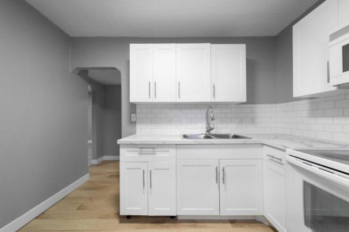 5219 50 Avenue, Camrose, AB - Indoor Photo Showing Kitchen With Double Sink