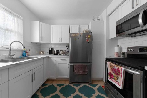 5219 50 Avenue, Camrose, AB - Indoor Photo Showing Kitchen With Double Sink