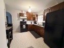 5003 55 Ave, Ponoka, AB  - Indoor Photo Showing Kitchen With Double Sink 