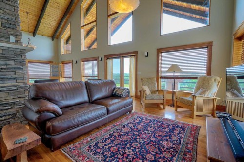 37311 Range Road 283, Rural Red Deer County, AB - Indoor Photo Showing Living Room With Fireplace