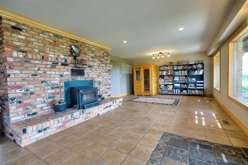 37311 Range Road 283, Rural Red Deer County, AB - Indoor With Fireplace