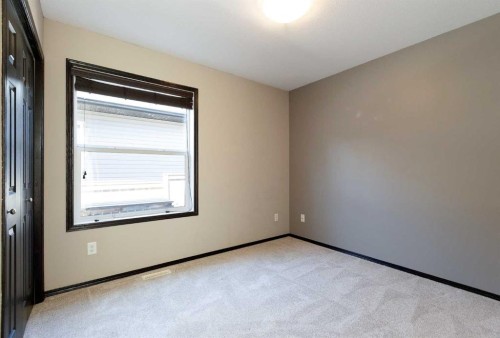 59 Burris Pointe, Lacombe, AB 