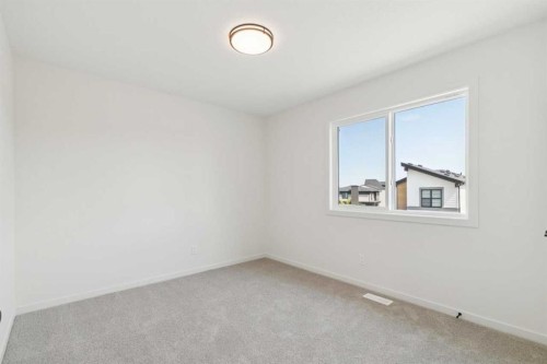 78 Alpine Common Sw, Calgary, AB - Indoor Photo Showing Other Room