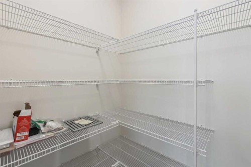 24 Southborough Common, Cochrane, AB - Indoor With Storage