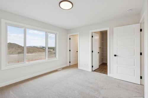24 Southborough Common, Cochrane, AB - Indoor Photo Showing Other Room