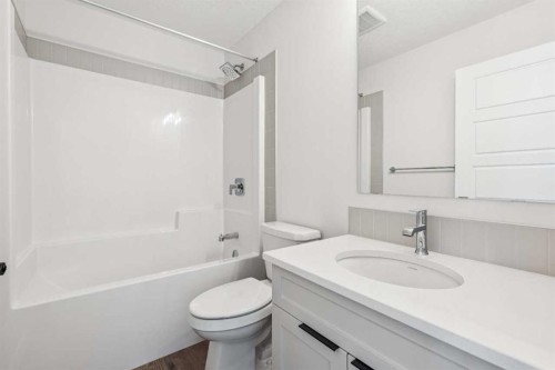 24 Southborough Common, Cochrane, AB - Indoor Photo Showing Bathroom