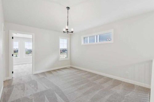 24 Southborough Common, Cochrane, AB - Indoor Photo Showing Other Room