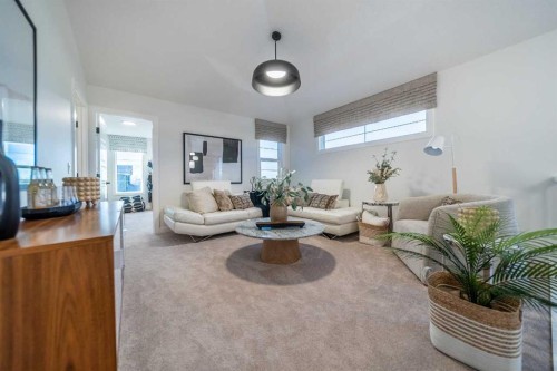 24 Southborough Common, Cochrane, AB - Indoor Photo Showing Living Room