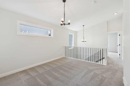 24 Southborough Common, Cochrane, AB - Indoor Photo Showing Other Room