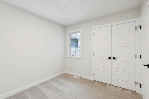 24 Southborough Common, Cochrane, AB - Indoor Photo Showing Other Room