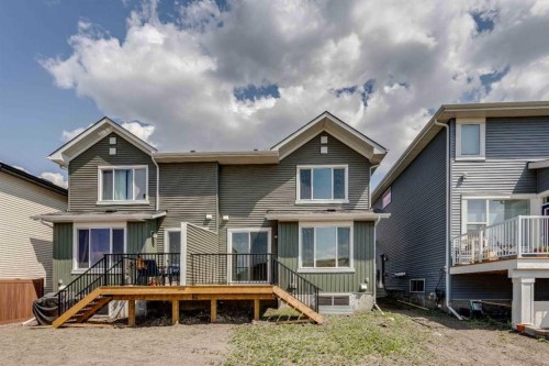 24 Southborough Common, Cochrane, AB - Outdoor With Deck Patio Veranda